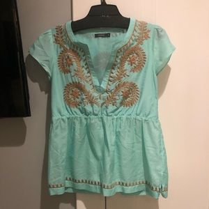Theme embroidered top